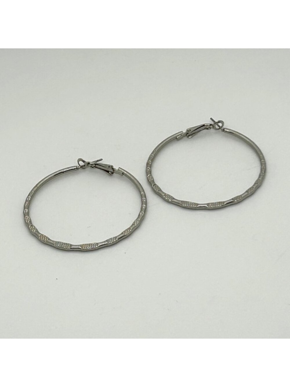 Vintage Omega Back Hoop Earrings Textured Silver Tone French Back Diamond Cut